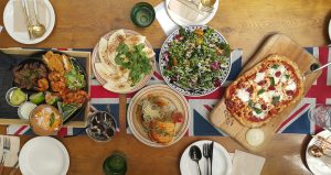 lunch table (pizza, salad, hot foods)