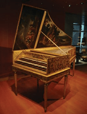 A photograph of a harpsichord.