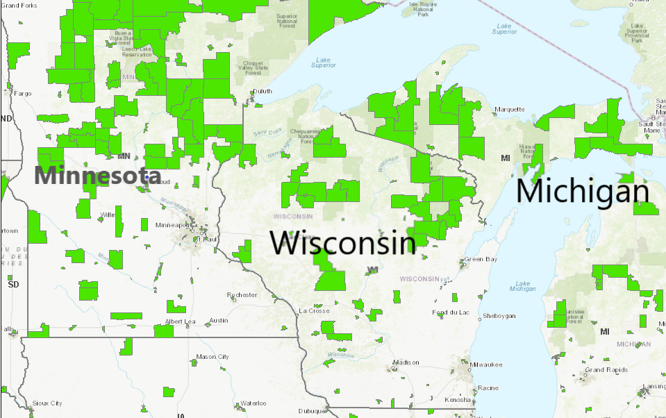 Map of Minnesota, Wisconsin and Michigan with lime green areas highlighted that demonstrate low-income areas with less access to supermarkets.