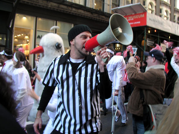 A man yelling into a megaphone